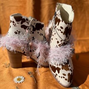 Stylish Cow Print Ankle Boots with Pink Accents